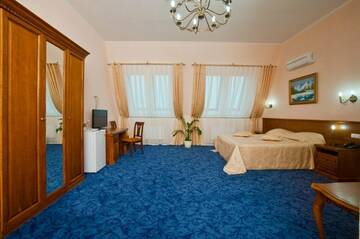 Улучшенный трехместный номер в Гостинице Сударушка